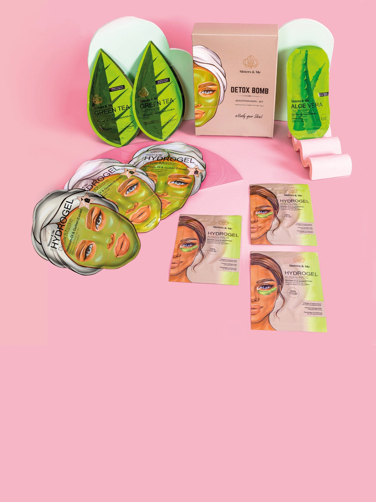 Sisters & Me Detox Bomb Detox-Hydrogel-Set mit Gesichtsmasken und Augenpads, Produkte und Verpackungen auf rosa Hintergrund